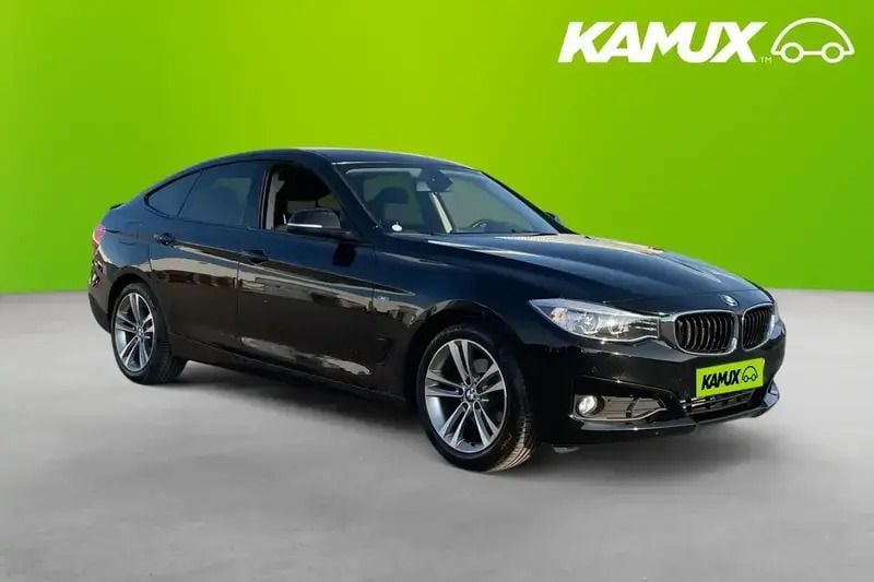 Svart Begagnad 2014 BMW 320 Halvkombi | 134 800 kr - Bild 1/4