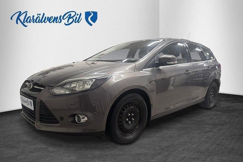 Brun Begagnad 2013 Ford Focus Titanium Kombi | 79 900 kr (Lite dyr) - Bild 1/4