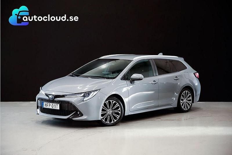 Grå Begagnad 2020 Toyota Corolla Hybrid Style Kombi | 179 800 kr (Marknadspris) - Bild 1/3