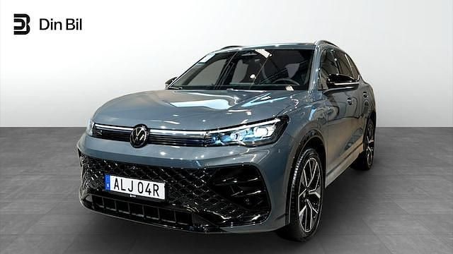 Mörkgrå Begagnad 2025 VW Tiguan R-line SUV | 559 900 kr - Bild 1/4