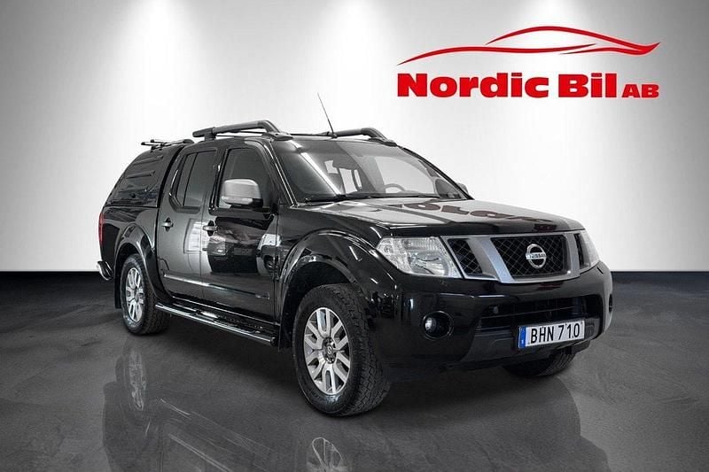 Svart Begagnad 2014 Nissan Navara Pickup | 139 900 kr (Marknadspris) - Bild 1/4