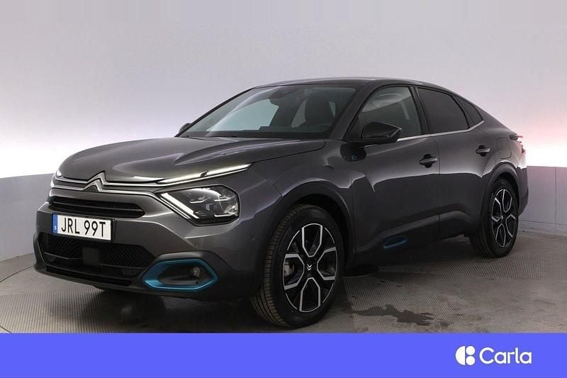 Grå Begagnad 2022 Citroën e-C4 Exclusive Sedan | 252 900 kr (Marknadspris) - Bild 1/4