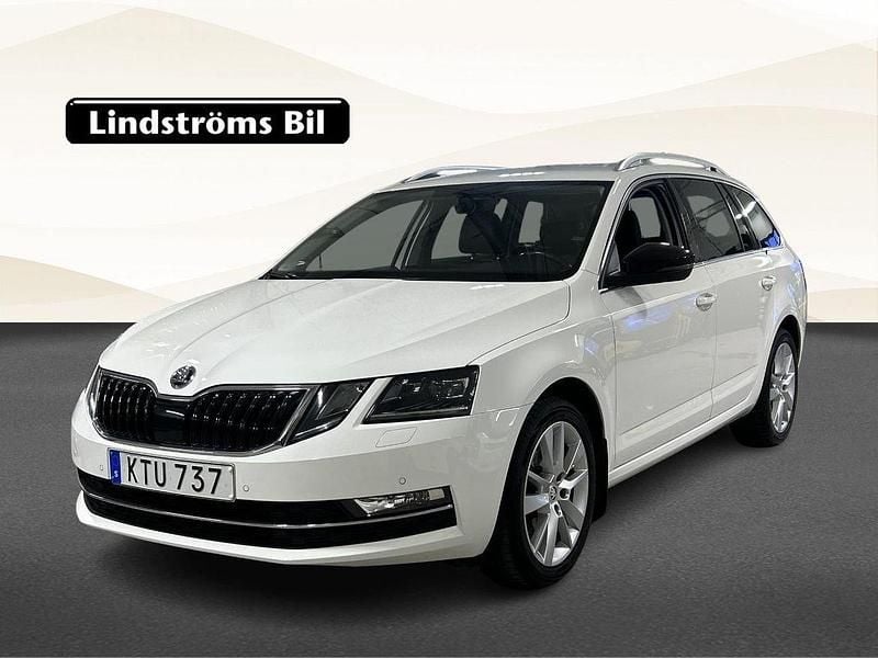 Vit Begagnad 2018 Skoda Octavia Kombi | 174 900 kr (Marknadspris) - Bild 1/3