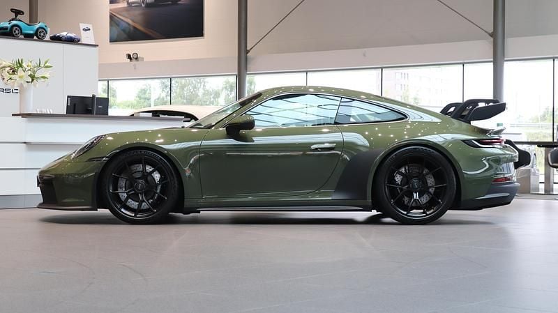 Begagnad Porsche 911 517 HK (380 kW) 2021 Mörkgrön
