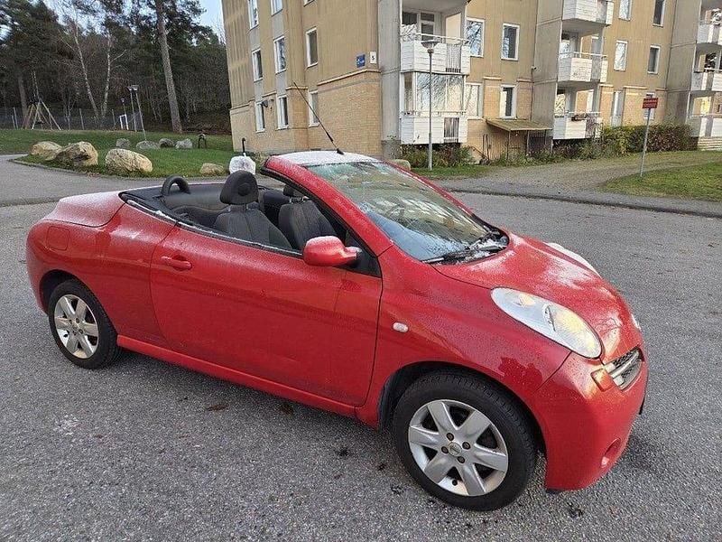 Röd Begagnad 2006 Nissan Micra Cab | 22 000 kr (Marknadspris) - Bild 1/4