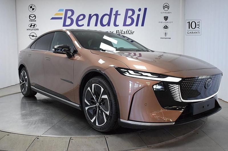 Melting copper Ny 2025 Mazda 6e Takumi-Line Sedan | 449 500 kr (Marknadspris) - Bild 1/3