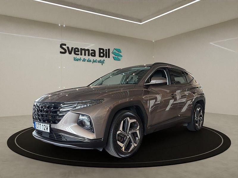 Brun Begagnad 2021 Hyundai Tucson Advanced SUV | 324 900 kr (Marknadspris) - Bild 1/4