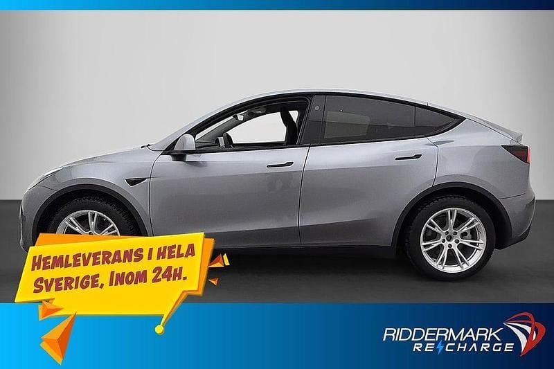Begagnad Tesla Model Y Long Range AWD 378 kW (514 HK) 2024 Grå SUV