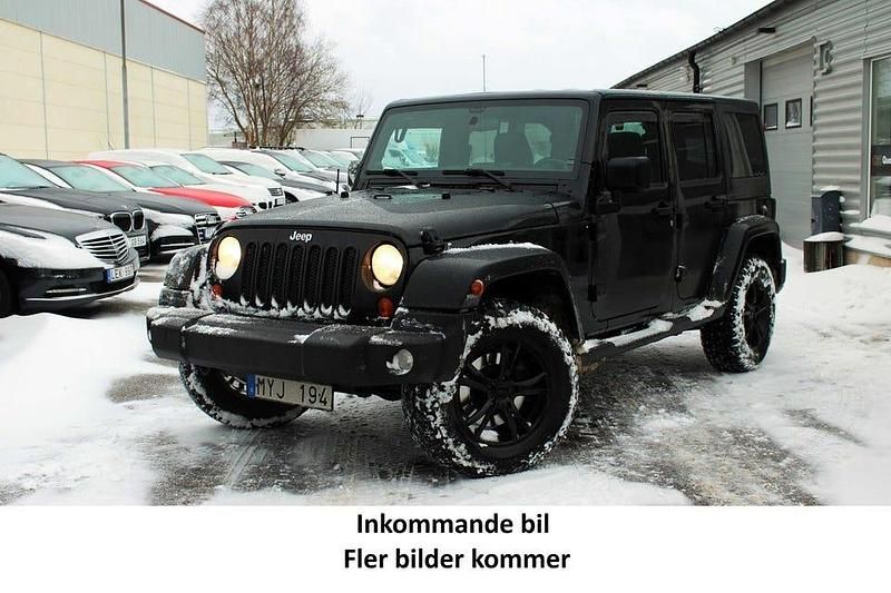 Svart Begagnad 2012 Jeep Wrangler Unlimited SUV | 274 900 kr (Dyr) - Bild 1/4