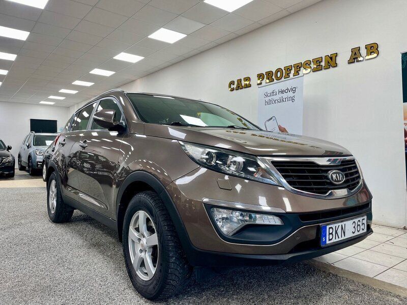 Ljusbrun (brun) Begagnad 2012 Kia Sportage Comfort SUV | 74 900 kr (Marknadspris) - Bild 1/4