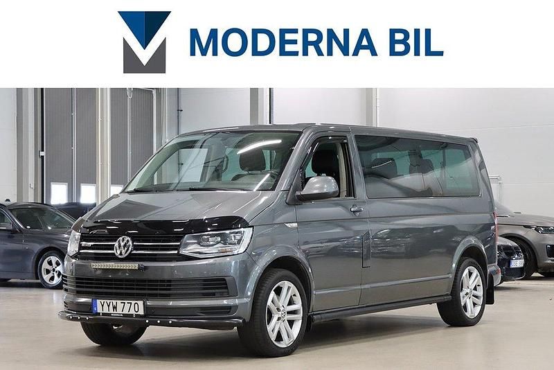 Grå Begagnad 2017 VW Caravelle Comfortline Minibuss | 319 400 kr - Bild 1/4