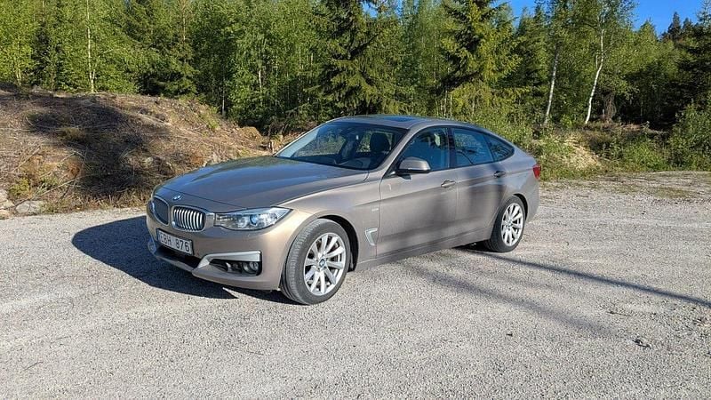 Brun Begagnad 2014 BMW 320 Gran Turismo Halvkombi | 148 000 kr (Marknadspris) - Bild 1/4