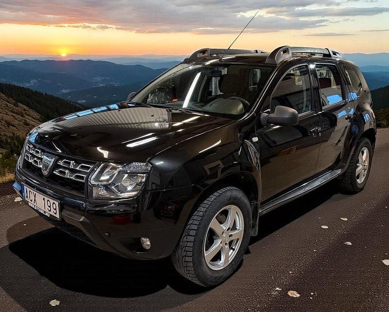 Svart (svartmetallic) Begagnad 2013 Dacia Duster SUV | 85 000 kr (Marknadspris) - Bild 1/4