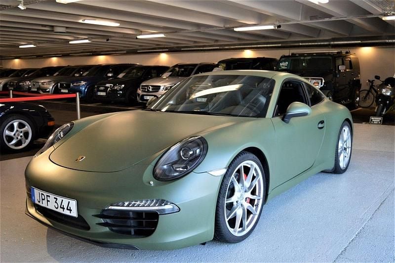 Svart (svartmetallic) Begagnad 2012 Porsche 911 Carrera S Sport Sportkupé | 1 159 900 kr - Bild 1/4