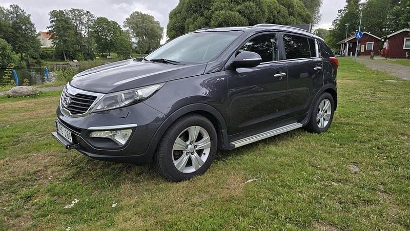 Grå Begagnad 2012 Kia Sportage EX SUV | 89 000 kr (Marknadspris) - Bild 1/4