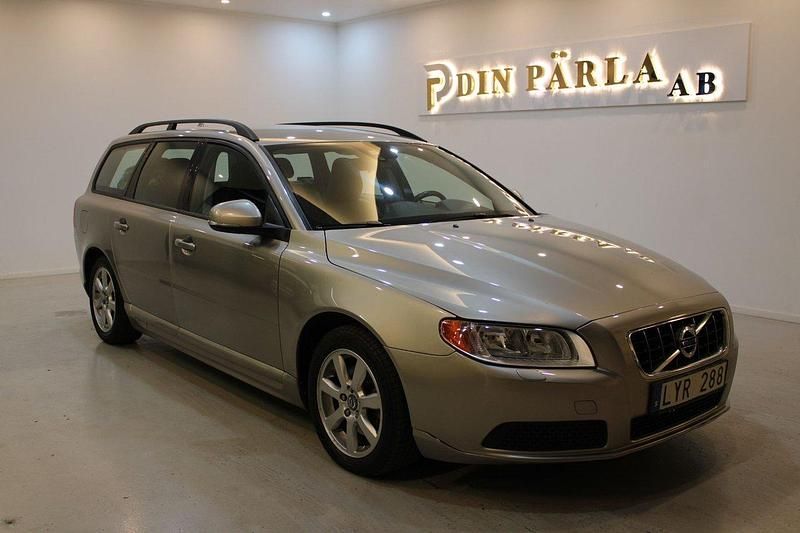 Ljusbrun (brun) Begagnad 2012 Volvo V70 Drive Kinetic Kombi | 84 900 kr (Marknadspris) - Bild 1/4