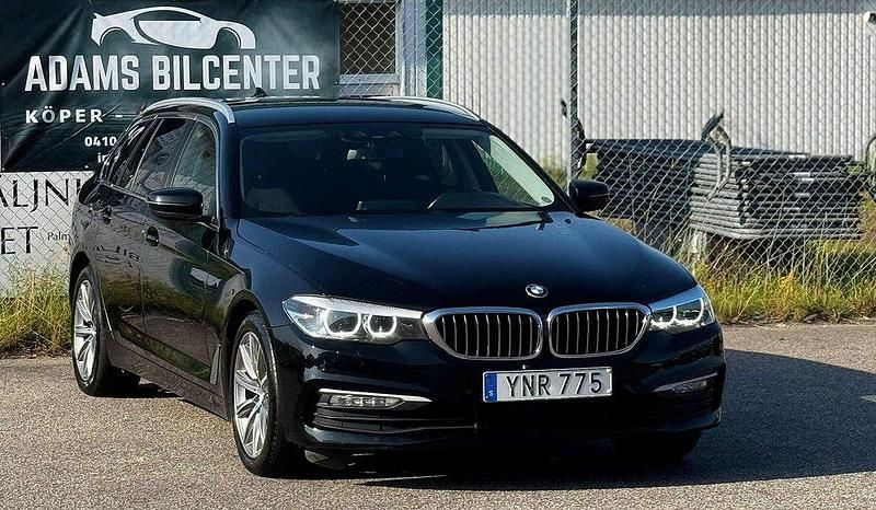 Svart Begagnad 2017 BMW 520 Kombi | 214 599 kr (Marknadspris) - Bild 1/4