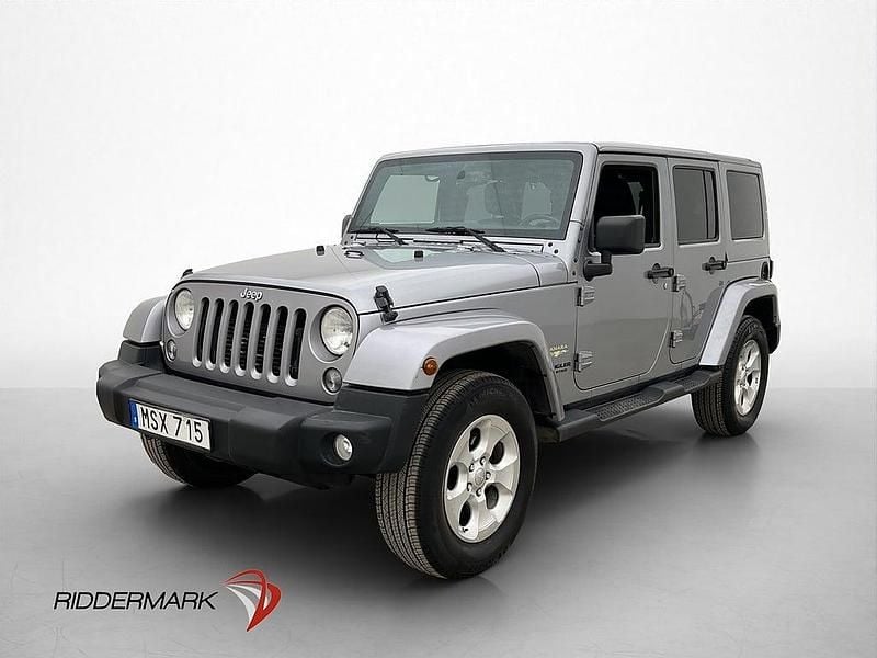 Begagnad Jeep Wrangler Unlimited Sahara 200 HK (147 kW) 2015 Grå SUV