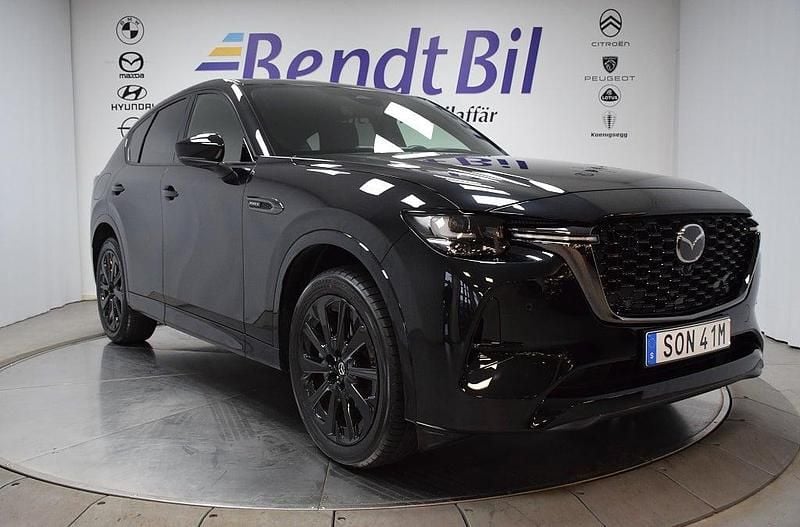 Grå Begagnad 2025 Mazda CX-60 Homura-Line SUV | 584 500 kr (Dyr) - Bild 1/3