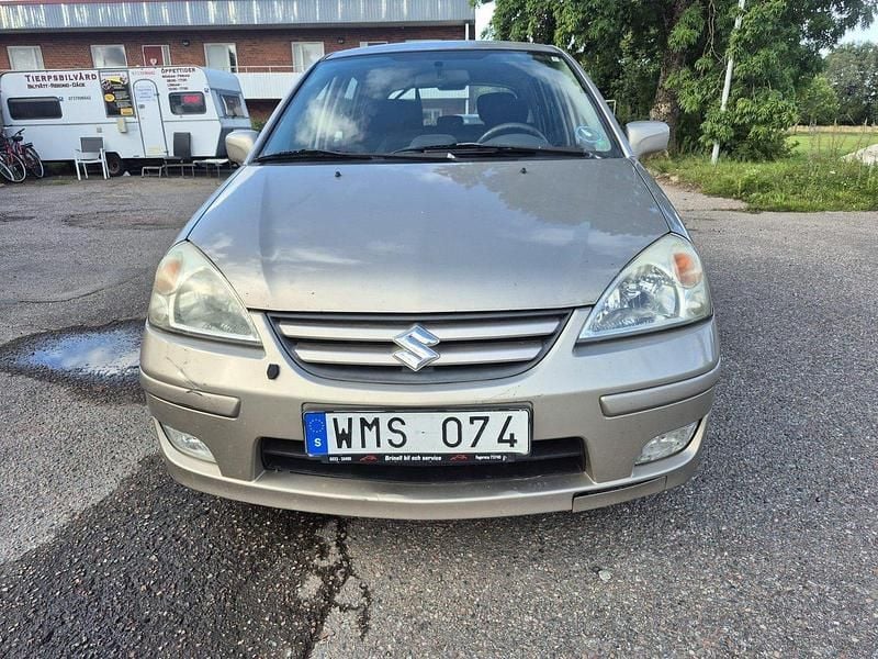 Brun Begagnad 2005 Suzuki Liana Halvkombi | 15 000 kr (Lite dyr) - Bild 1/4