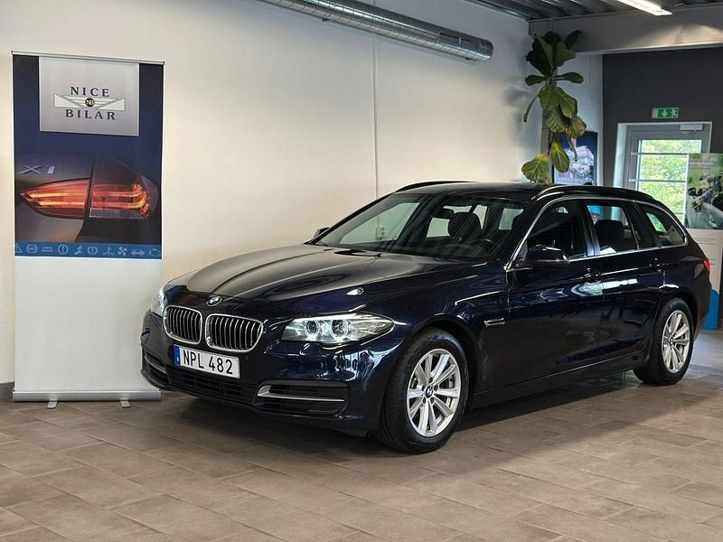 Blå Begagnad 2014 BMW 520 Kombi | 129 000 kr (Marknadspris) - Bild 1/4