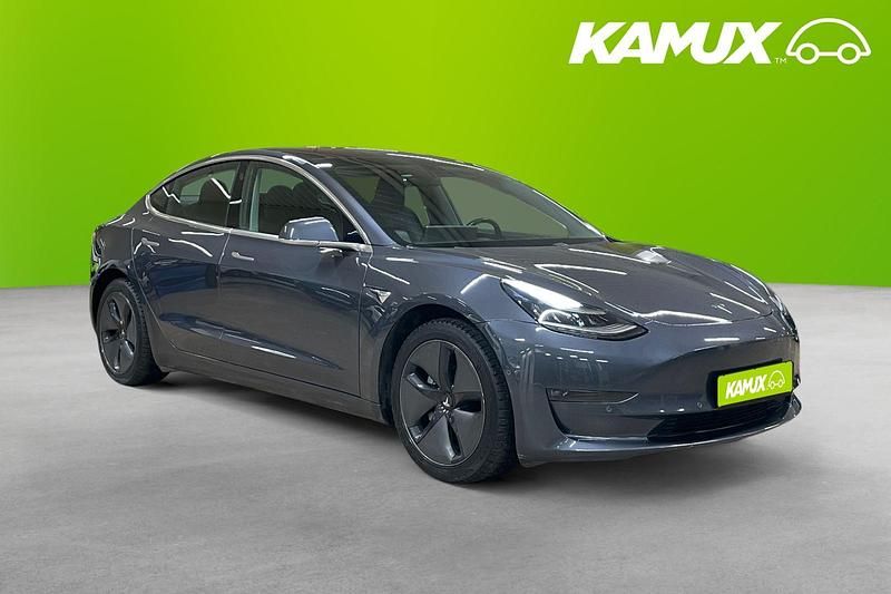 Silver/grå Begagnad 2019 Tesla Model 3 Long Range AWD Sedan | 214 700 kr (Marknadspris) - Bild 1/4