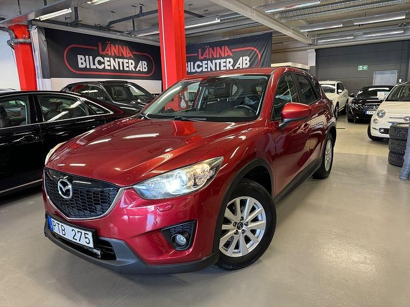 Röd metallic Begagnad 2013 Mazda CX-5 SUV | 119 900 kr (Marknadspris) - Bild 1/4