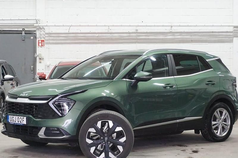 Grönmetallic Begagnad 2023 Kia Sportage Advance SUV | 329 900 kr (Bra pris) - Bild 1/4