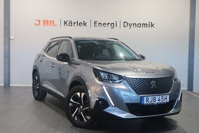 Grå artense Begagnad 2022 Peugeot e-2008 Allure SUV | 189 900 kr (Marknadspris) - Bild 1/4