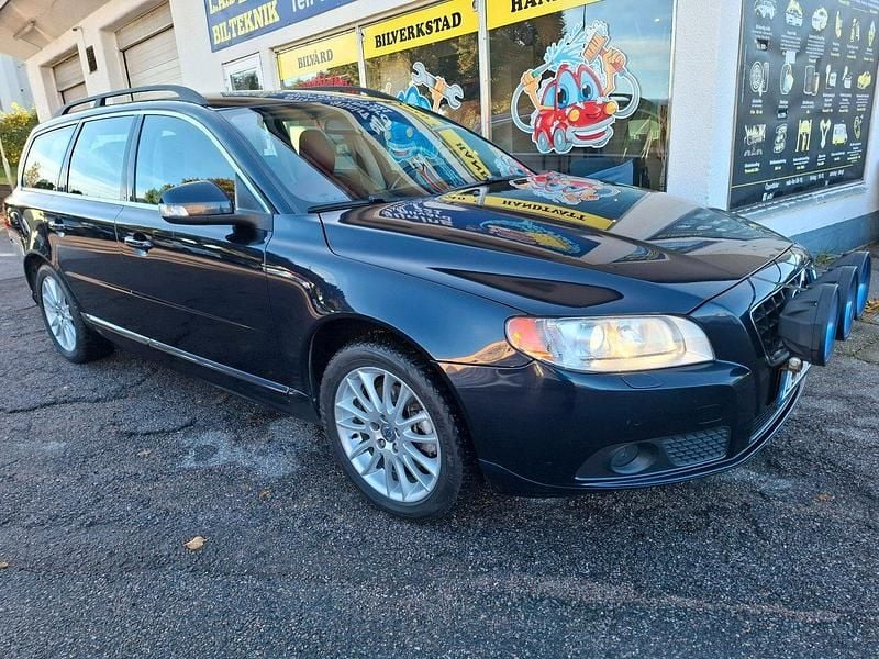Mörkblå Begagnad 2010 Volvo V70 Momentum Kombi | 89 900 kr (Marknadspris) - Bild 1/4