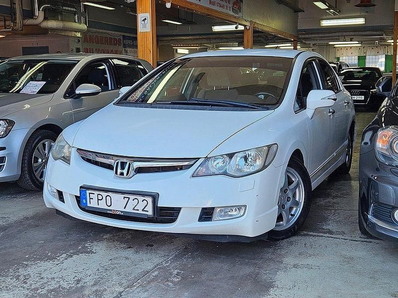 Vit Begagnad 2007 Honda Civic Hybrid Sedan | 39 999 kr (Marknadspris) - Bild 1/4