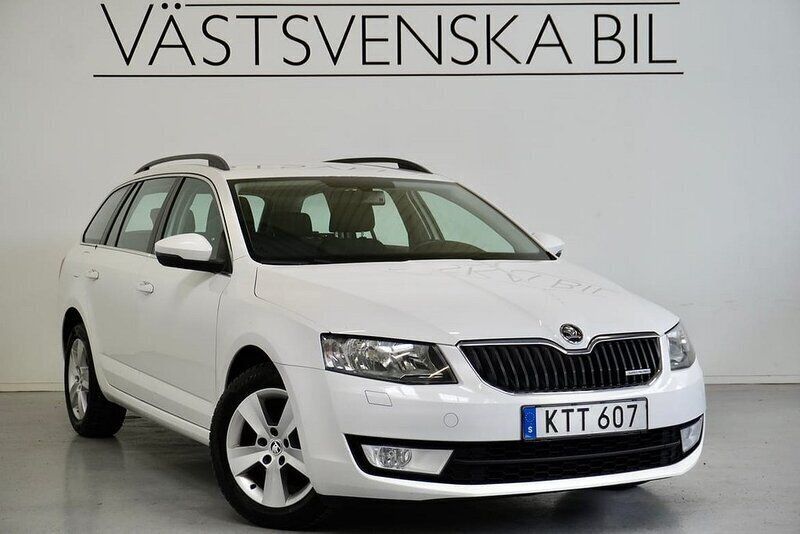 Vit Begagnad 2014 Skoda Octavia Kombi | 89 000 kr (Marknadspris) - Bild 1/4