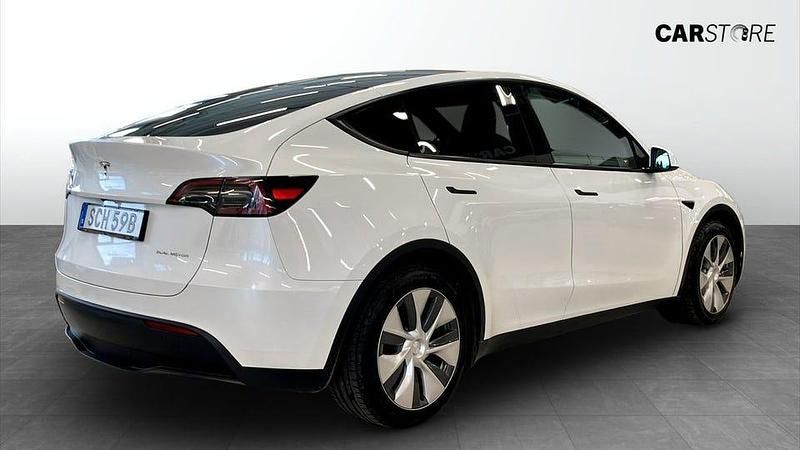 Begagnad Tesla Model Y Long Range AWD 378 kW (514 HK) 2024 Vit SUV