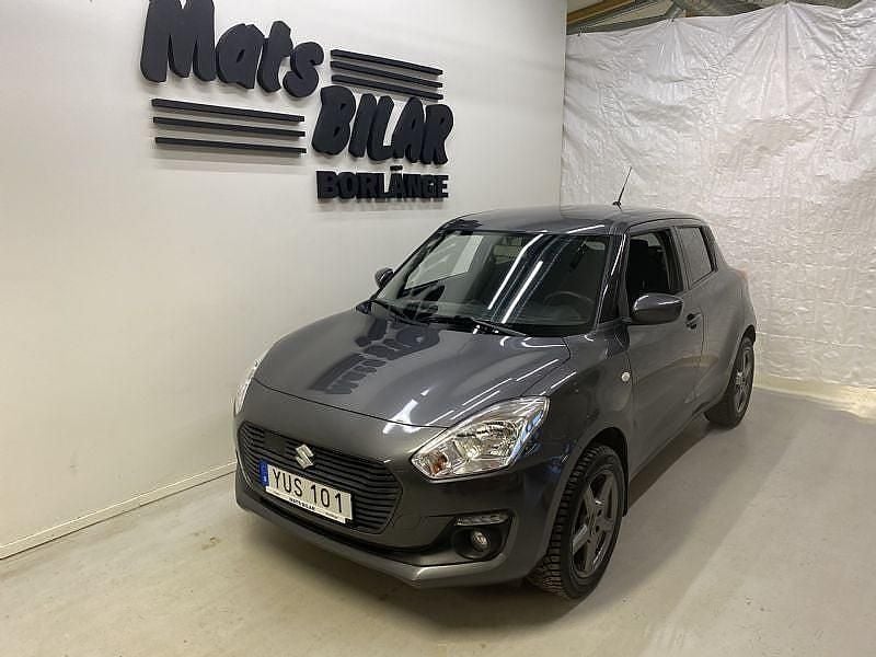 Grå Begagnad 2018 Suzuki Swift Halvkombi | 139 900 kr (Marknadspris) - Bild 1/4