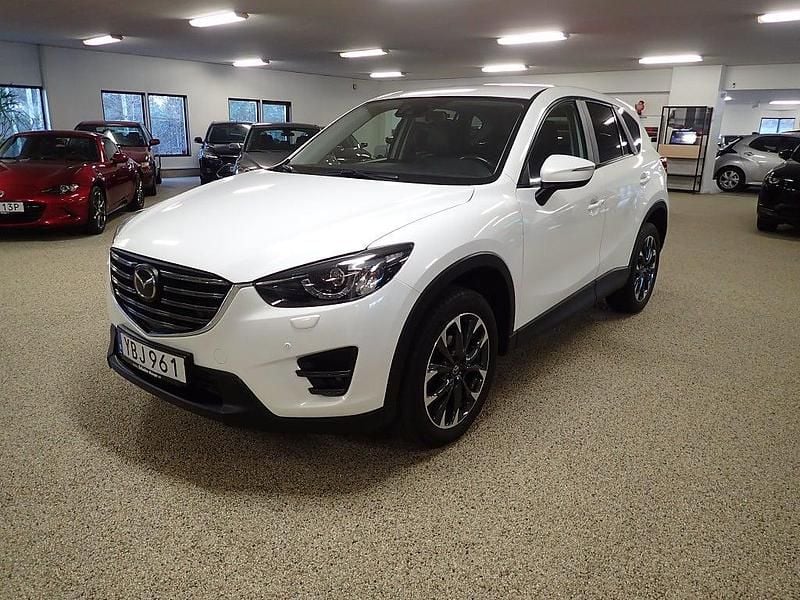 Crystal white pearl met. Begagnad 2015 Mazda CX-5 Optimum SUV | 174 000 kr (Marknadspris) - Bild 1/4