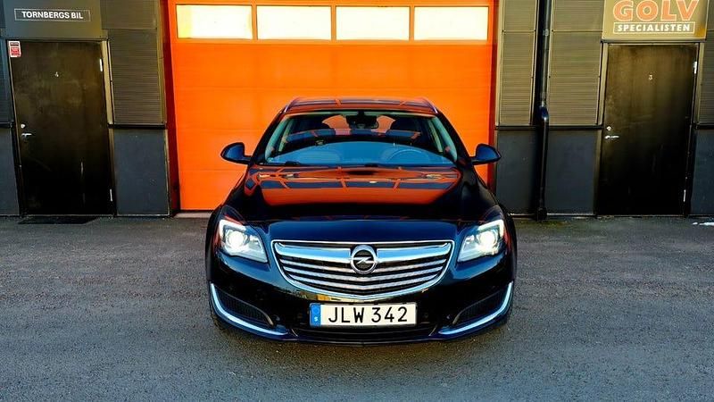Svart Begagnad 2014 Opel Insignia Kombi | 119 900 kr (Marknadspris) - Bild 1/4