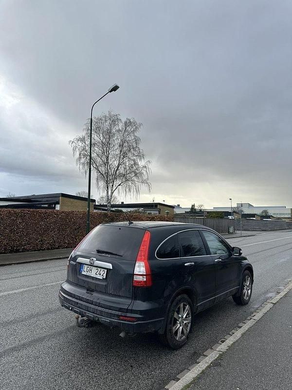 Svart Begagnad 2011 Honda CR-V Exclusive SUV | 80 000 kr (Marknadspris) - Bild 1/4