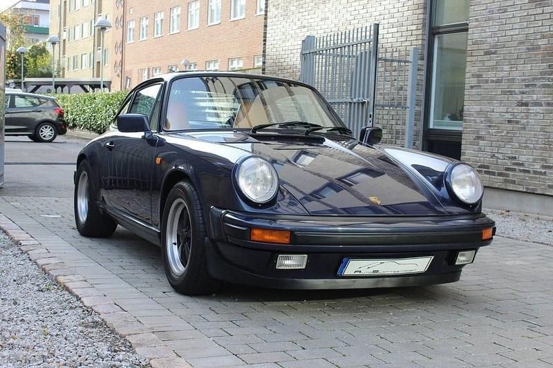 Prussian blå Begagnad 1986 Porsche 911 Carrera Sportkupé | 895 000 kr - Bild 1/4