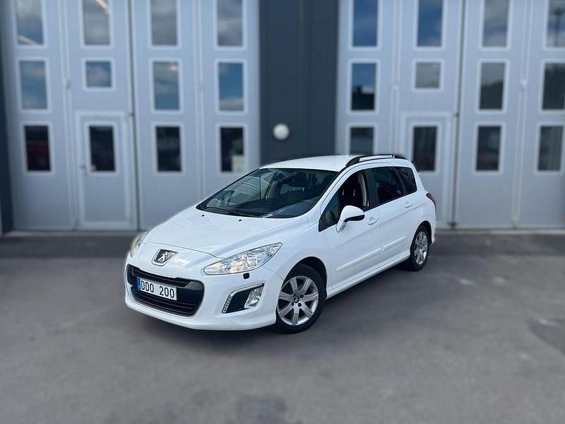Begagnad Peugeot 308 SW 114 HK (83 kW) 2013 Vit Kombi