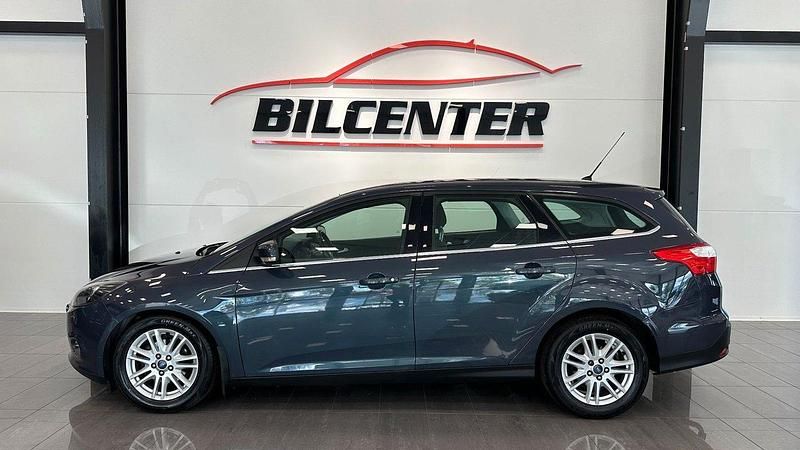 Grå Begagnad 2014 Ford Focus Titanium Kombi | 74 900 kr (Dyr) - Bild 1/4
