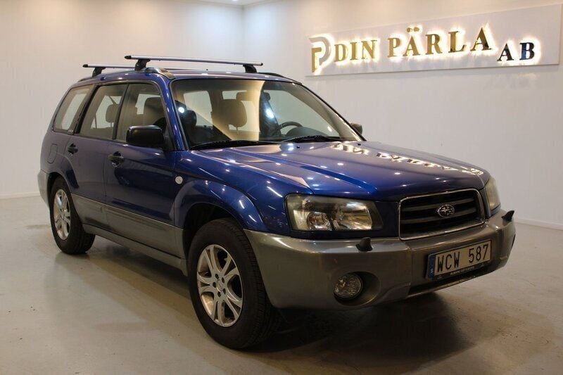Mörkblå (blå) Begagnad 2005 Subaru Forester SUV | 59 900 kr (Bra pris) - Bild 1/4