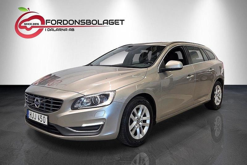 Ljusbrun (brun) Begagnad 2014 Volvo V60 Momentum Kombi | 119 700 kr (Marknadspris) - Bild 1/4