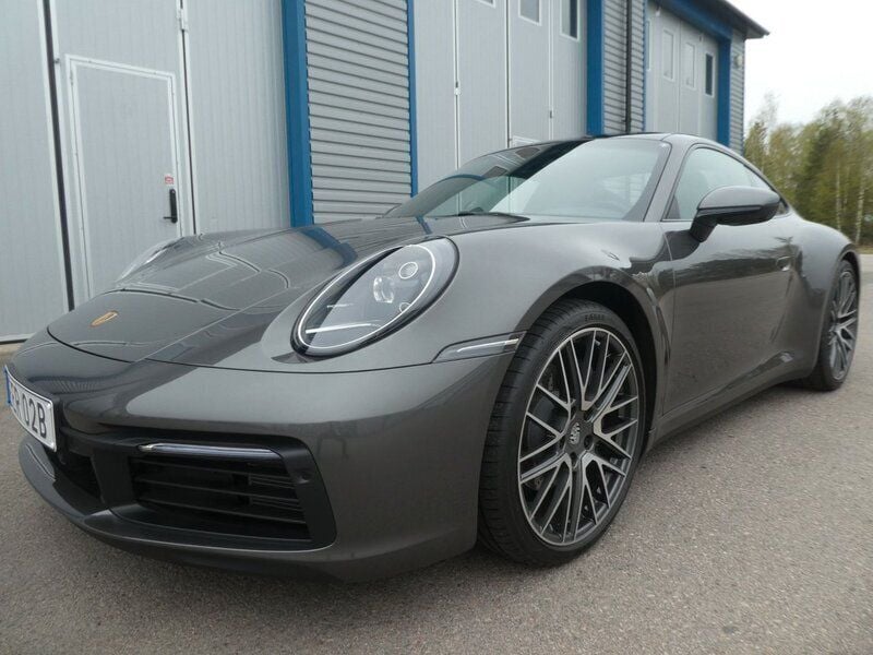 Mörkgrå (gråmet.) Begagnad 2024 Porsche 911 Carrera Sportkupé | 1 375 000 kr (Superpris) - Bild 1/4