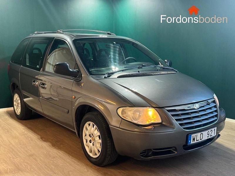 Mörkgrå Begagnad 2004 Chrysler Voyager Minibuss | 29 900 kr (Bra pris) - Bild 1/4