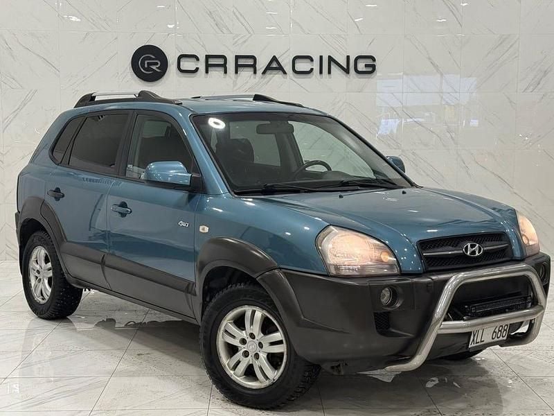 Blå Begagnad 2007 Hyundai Tucson SUV | 44 900 kr (Marknadspris) - Bild 1/4