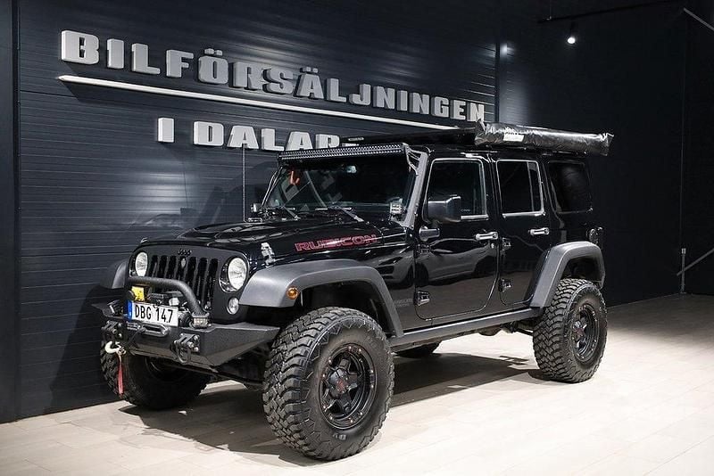 Svart Begagnad 2014 Jeep Wrangler Unlimited Rubicon SUV | 369 000 kr (Dyr) - Bild 1/4