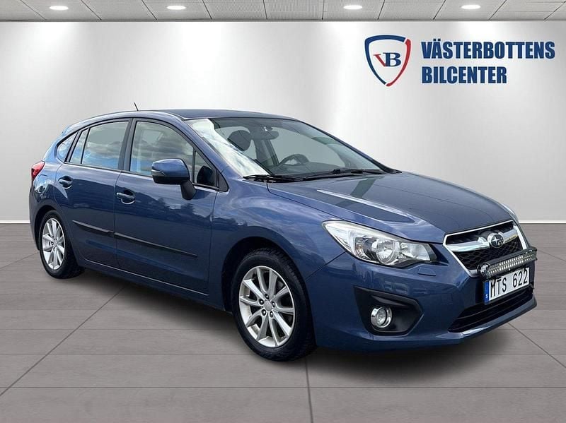 Mörkblå (blå) Begagnad 2013 Subaru Impreza Halvkombi | 94 900 kr (Marknadspris) - Bild 1/4