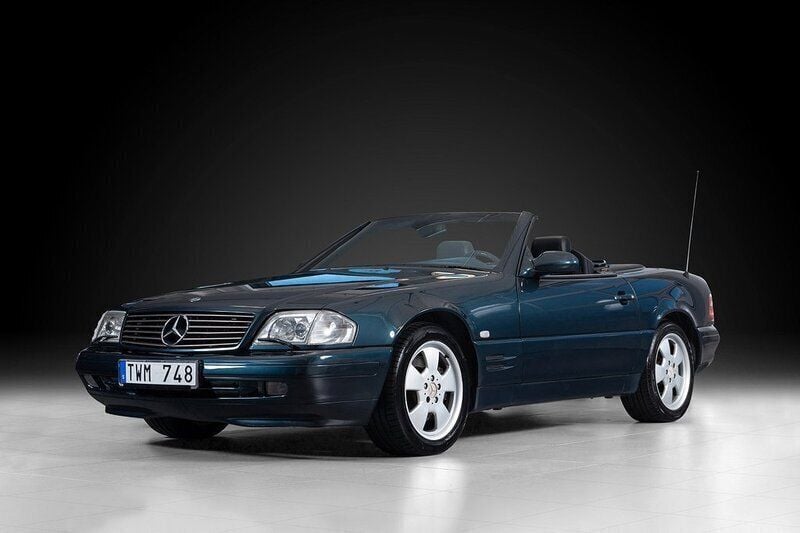 Mörkblå Begagnad 1999 Mercedes SL500 Cab | 295 000 kr - Bild 1/4