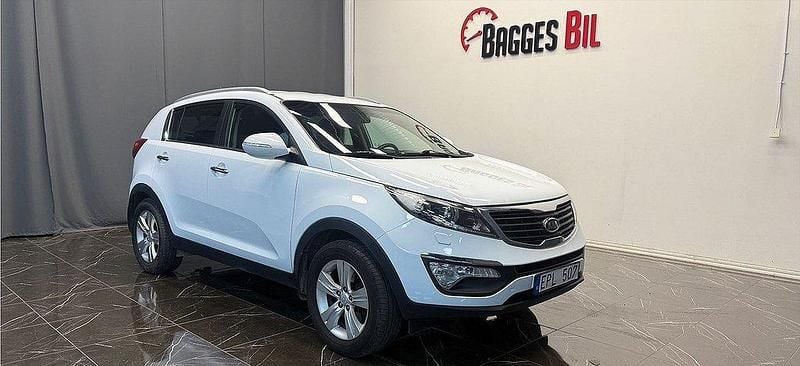 Vit Begagnad 2012 Kia Sportage SUV | 89 400 kr (Bra pris) - Bild 1/4