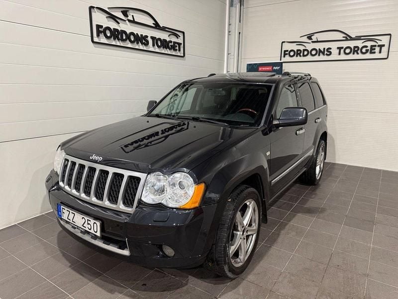 Mörkgrå (grå) Begagnad 2011 Jeep Grand Cherokee SUV | 94 900 kr - Bild 1/4